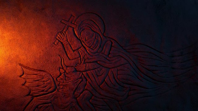 Saint Wrestles Devil Stone Carving In Candlelight