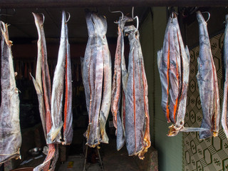 Traditional air dried salmon hung up for sale in Hokkaido, Japan