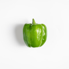 Green bell pepper isolated on white background.