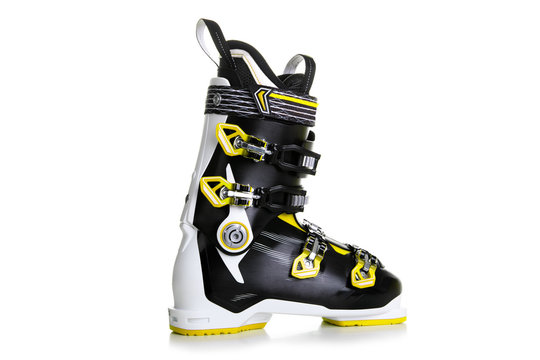 Profesional Yellow ski boots isolated on white background