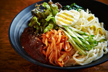 Korean mixed soba noodle with spicy sauce 