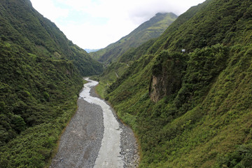 Fototapeta na wymiar View from the cable car into a canyon near Banos Ecuador