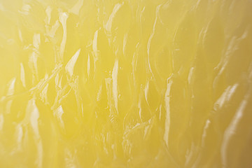 Bright juicy citrus pulp close-up. High-quality image is suitable for topics: healthy lifestyle, vitamins, proper nutrition, diet, summer, fresh juices. Background fruit texture.