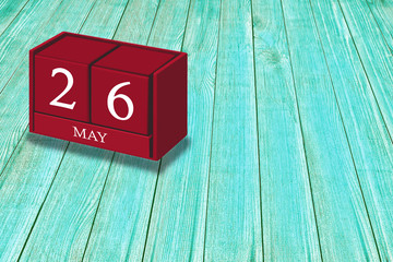 May 26th, Day 26 of May month, Red calendar on workplace green wood, Empty space for text, Copy space right