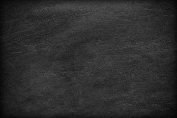 Dark grey black slate background or texture.