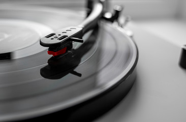 Vinyl turntable on a white background. Retro audio equipment for vinyl disk.