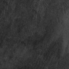 Dark grey black slate background or texture.