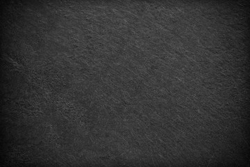 Dark grey black slate background or texture.