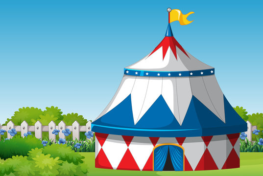 Scene with circus tent in the park at day time