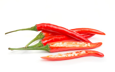 Red fresh chillies on a white background