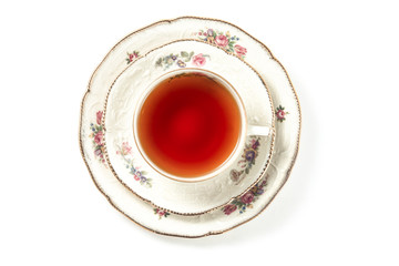 Cup of tea on a white background, closeup top view