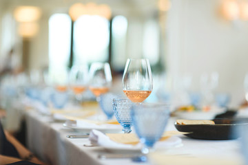 row of glasses with wine