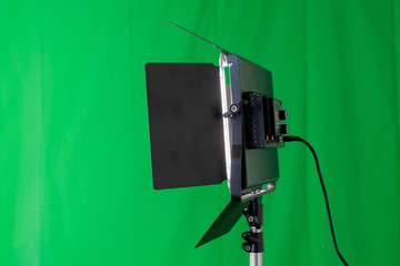 Video light in front of a green screen