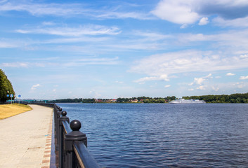 Fototapeta premium Bright summer day in the Strelka of Yaroslavl Beautiful landscaping of the Park on the embankment of the Volga and Kotorosl in Yaroslavl
