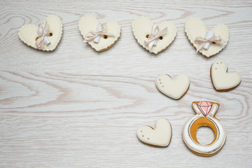 Ginderbread white heart cookies on the table baked for Valentine's day.