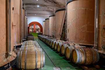 Traditional winery bodega on south of La Palma island with steel or concrete casks and wooden barrels in wine cellars, wine production on Canary Islands, Spain © barmalini