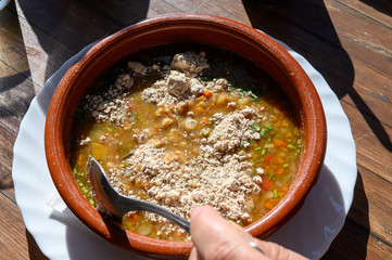 Homemade vegetables soup served with Canarian gofio flour based on local recipe of Masca village,...