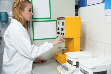 food research in the laboratory. female lab assistant working with equipment in a laboratory