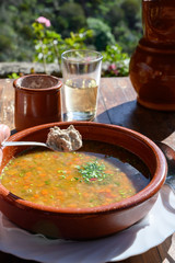 Homemade vegetables soup served with Canarian gofio flour based on local recipe of Masca village, Tenerife, Spain