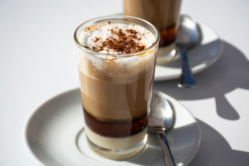 Special coffee of Canary islands, sweet barraquito coffee with layers and alcohol served in glass