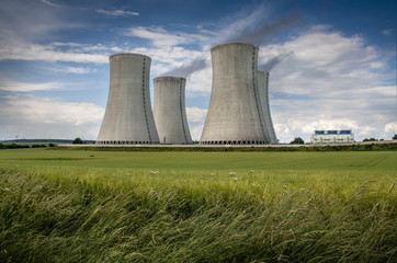 Cooling towers of nuclear power plant, summer day with cloudy sky, Dukovany, Czech Republic