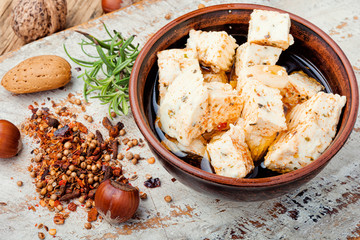 Homemade feta cheese with herbs