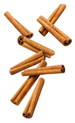 Flying cinnamon sticks, isolated on white background