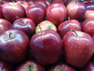 red apples on black background