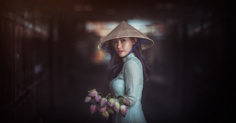 Beautiful woman with Vietnam culture traditional dress, Traditional costume , vintage style, Vietnam