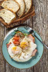 Fried eggs with pork ham.