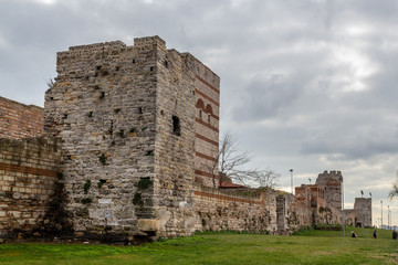 Fototapeta na wymiar Eastern roman byzantine walls surrounding historical old Istanbul peninsula. Topkapi and Edirnekapi region. Turkey
