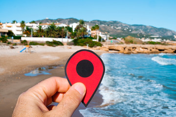 red marker at del Moro beach in Alcossebre, Spain.