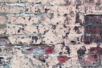 old brick wall faded tan paint