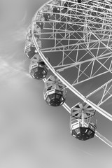 Enigmatic black and white Ferris wheel image