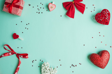 Valentines Day background. Red heart, gift box, ribbon shaped as heart