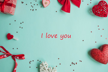 Valentines Day background. Red heart, gift box, ribbon shaped as heart