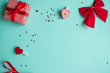 Valentines Day background. Red heart, gift box, ribbon shaped as heart