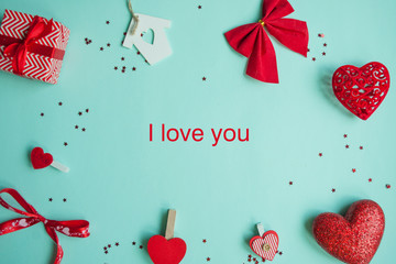 Valentines Day background. Red heart, gift box, ribbon shaped as heart