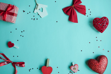 Valentines Day background. Red heart, gift box, ribbon shaped as heart