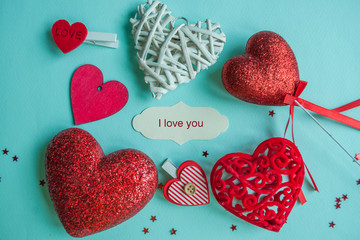 Valentines Day background. Red heart, gift box, ribbon shaped as heart