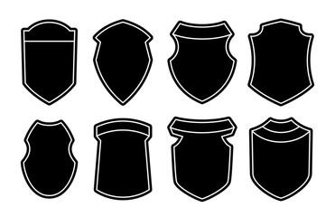 Set of blank empty dark shields. Black badge shapes. Vintage heraldic banner shapes design. Retro style borders, frames, labels