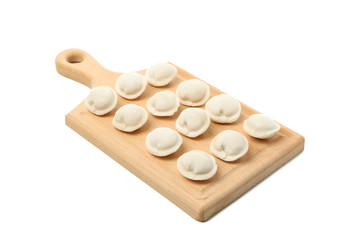 Obraz na płótnie Canvas Cutting board with raw dumplings isolated on white background
