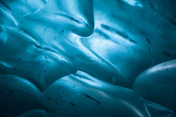 abstrac pattern of ice waves in ice cave in iceland, jokulsarlon skaftafell jokull