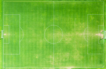 top view of green grass football stadium or field.