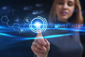 Business, Technology, Internet and network concept. Young businessman working on a virtual screen of the future and sees the inscription: Government