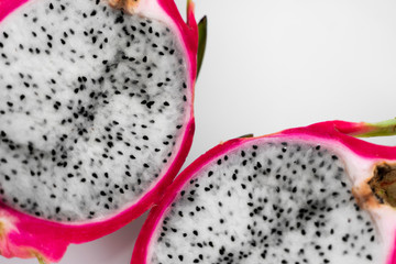 Dragon fruit. Vibrant Dragon Fruit on white background. Sliced white dragon fruit or pitaya on...