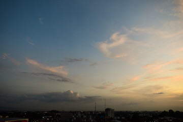 sunset sky and cloud above the town