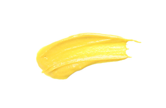 Cheese sauce spot isolated on white background, top view