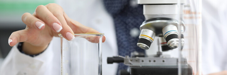 Fototapeta na wymiar Doctor investigating sample in lab