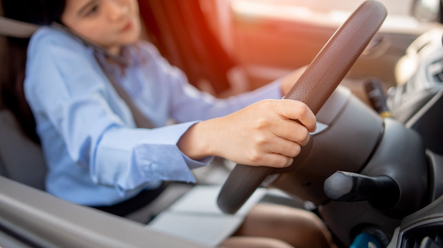 Woman talking on the phone while driving